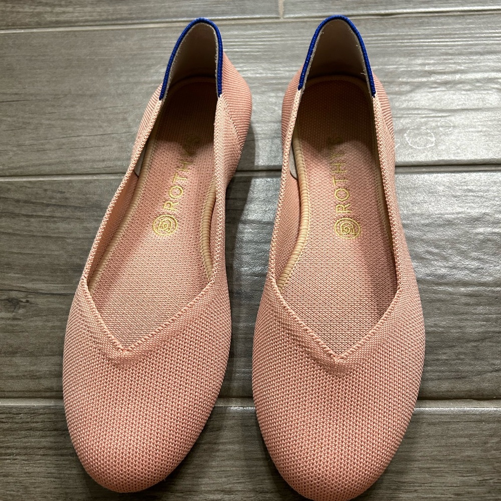 Rothy's pink with Blue trim Women's Flats gently used in box with packaging